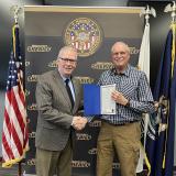 Walberg Presents Sheriff Pollack with Tribute